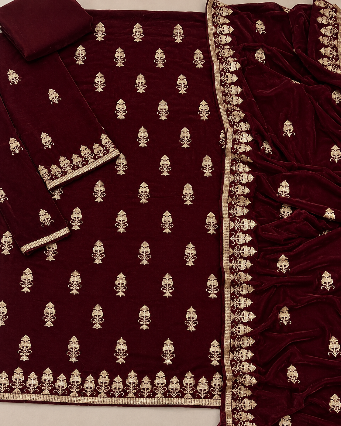 Maroon velvet 3-piece embroidered women's suit with embroidered front, back, daman, heavy embroidered sleeves, plain trouser, and luxury velvet shawl, AM Velvet.
